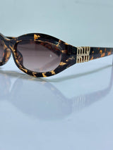 Miu Miu İthal Leopar Kadın Gözlük G3951-ILY yorum görseli